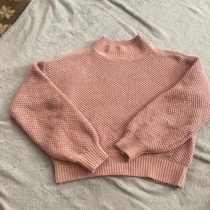 pink knitted sweater